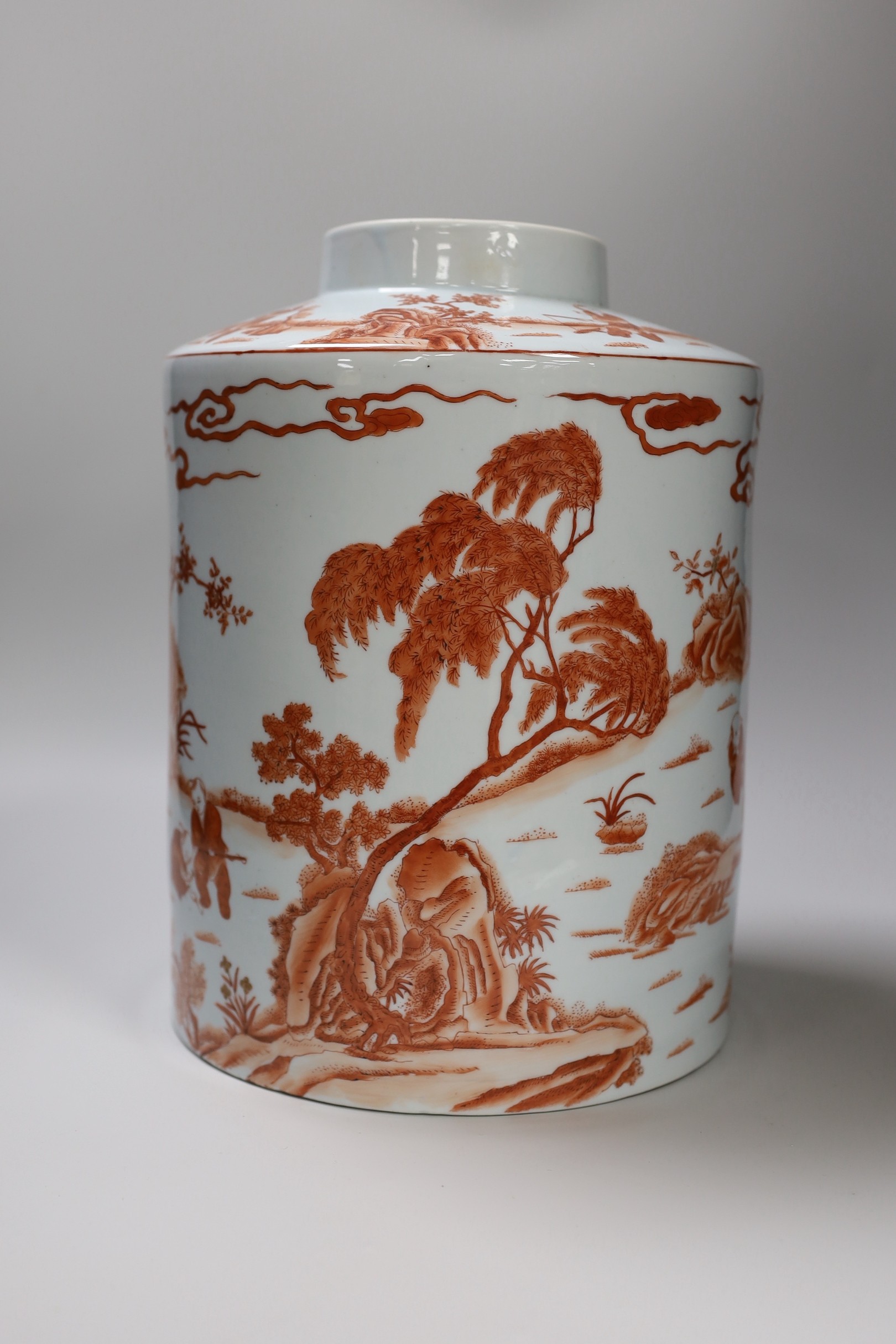 An early 20th century copper red enamelled canister. 30cm tall